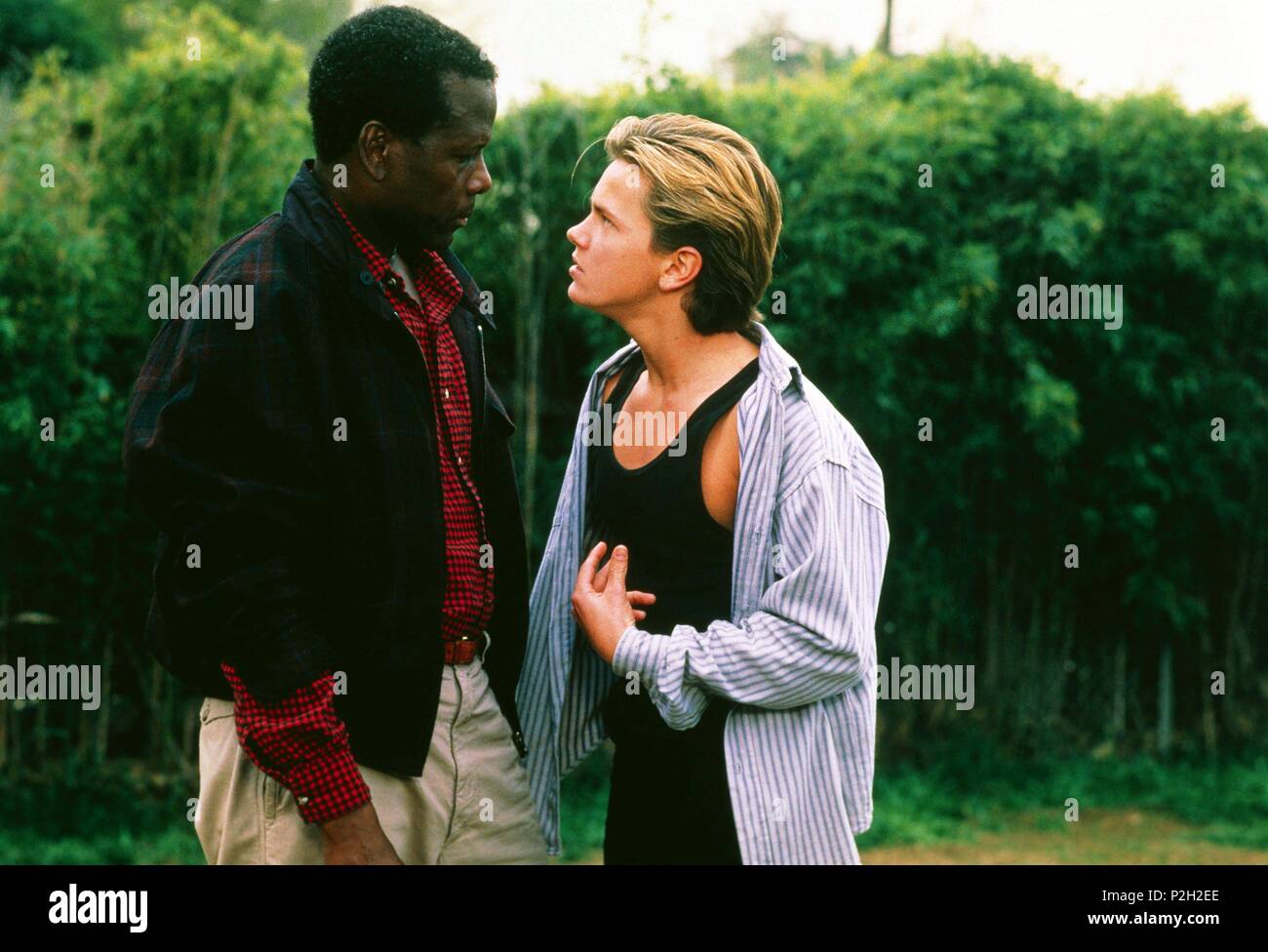 Description: Jul 09, 1988; Hollywood, CA, USA; Actors SIDNEY POITIER as Roy Parmenter and RIVER PHOENIX as Jeff Grant star in the drama thriller 'Little Nikita' directed by Richard Benjamin..  Original Film Title: LITTLE NIKITA.  English Title: LITTLE NIKITA.  Film Director: RICHARD BENJAMIN.  Year: 1988.  Stars: SIDNEY POITIER; RIVER PHOENIX. Stock Photo