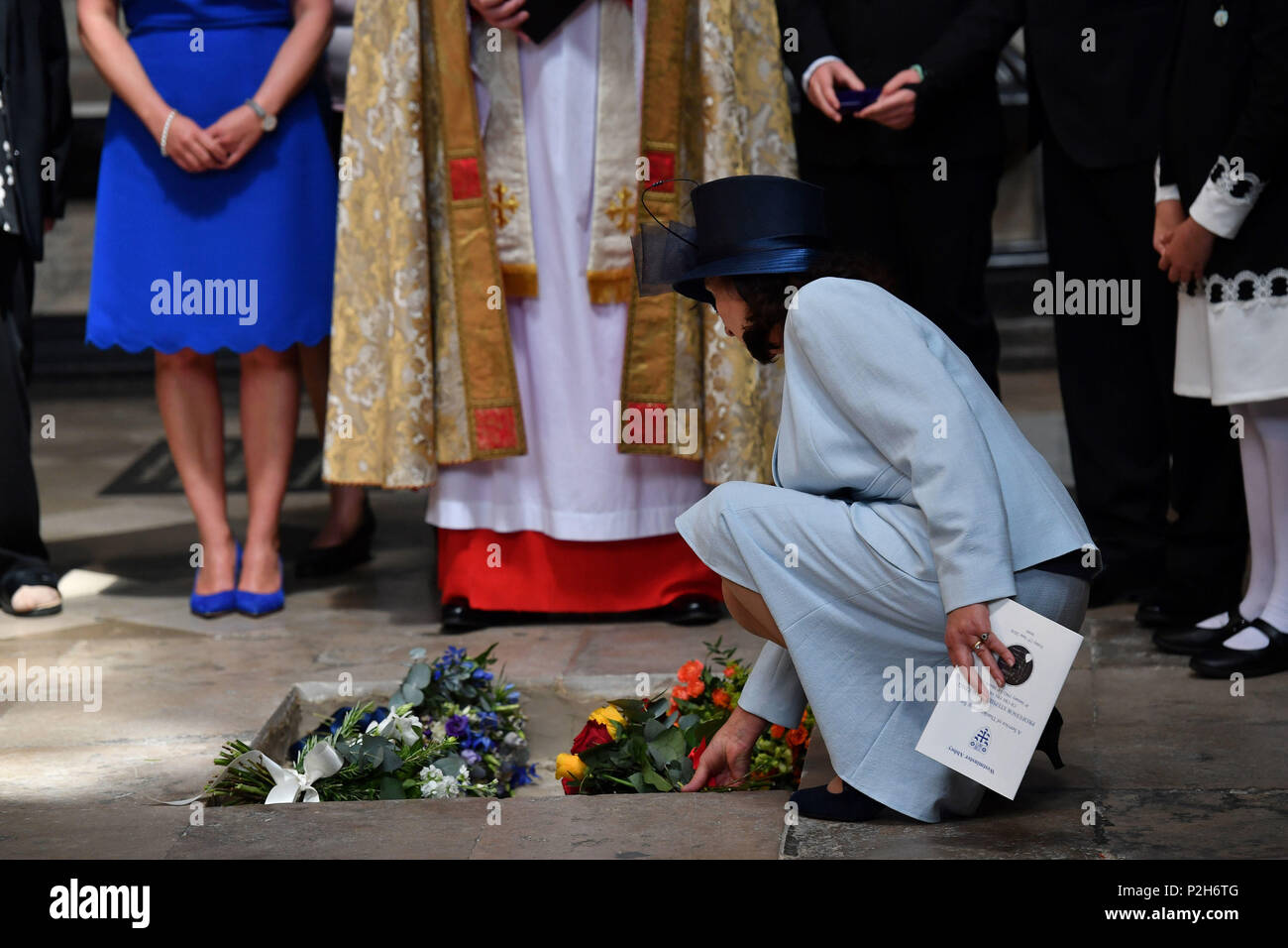 Jane Hawking lays flowers as the ashes of Professor Stephen Hawking, are laid to rest during his memorial service at Westminster Abbey, London. Stock Photo