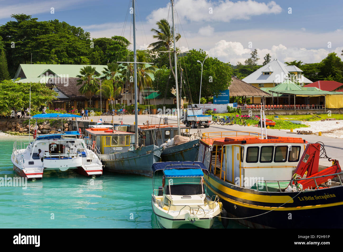 Boats in the harbour on La Digue Island, Seychelles Stock Photo