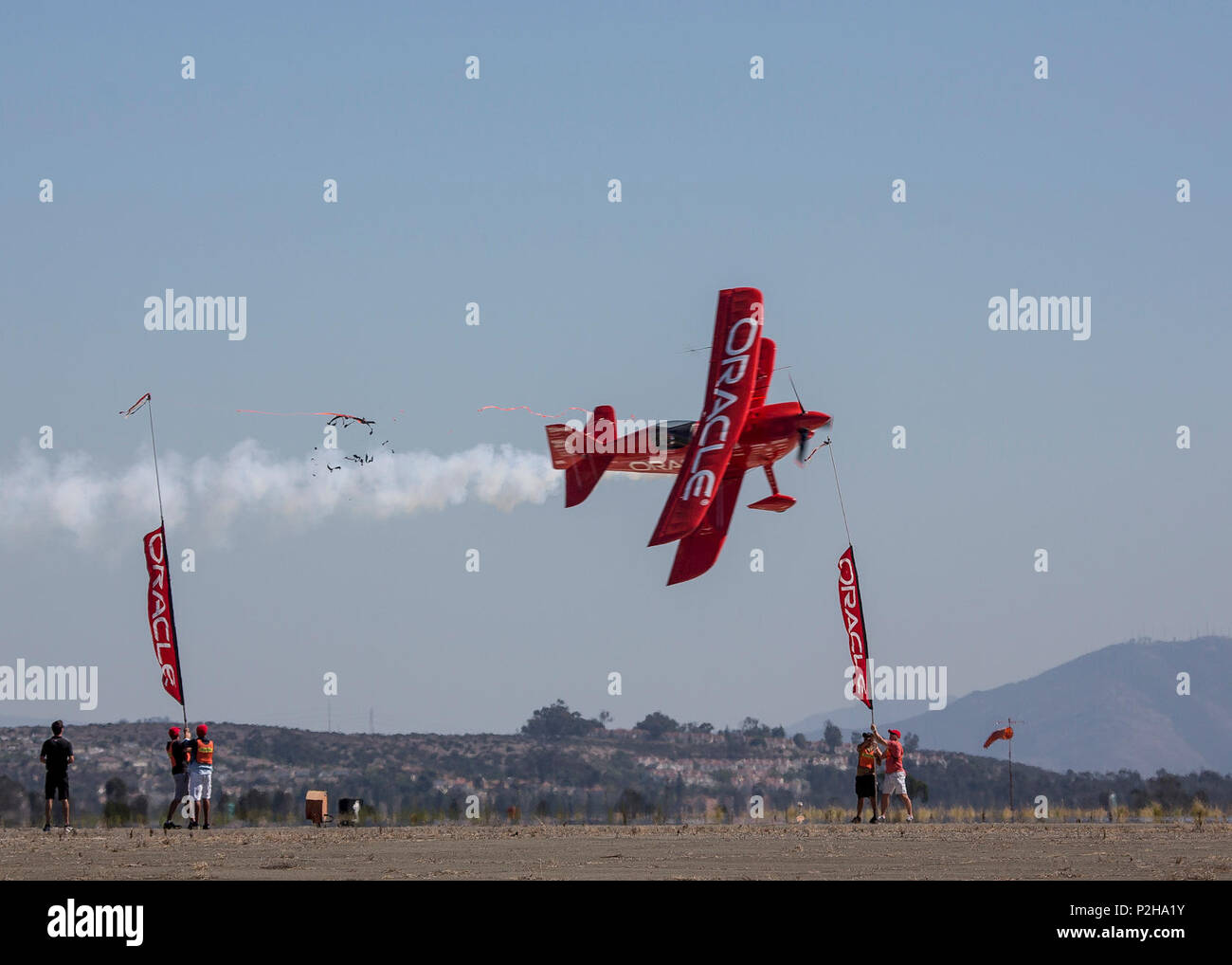 Aerobatic pilot Sean D. Tucker performs multiple stunts in the Oracle ...