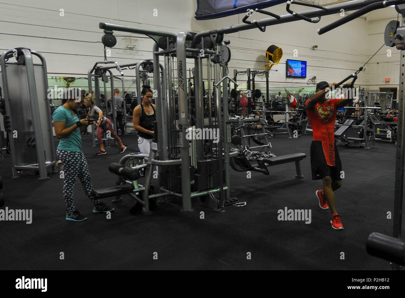 Air Commandos and their families workout at the Commando Fitness Center on  Hurlburt Field, Fla., Sept. 22, 2016. The staff of the fitness center are  now issuing access cards to dependents and