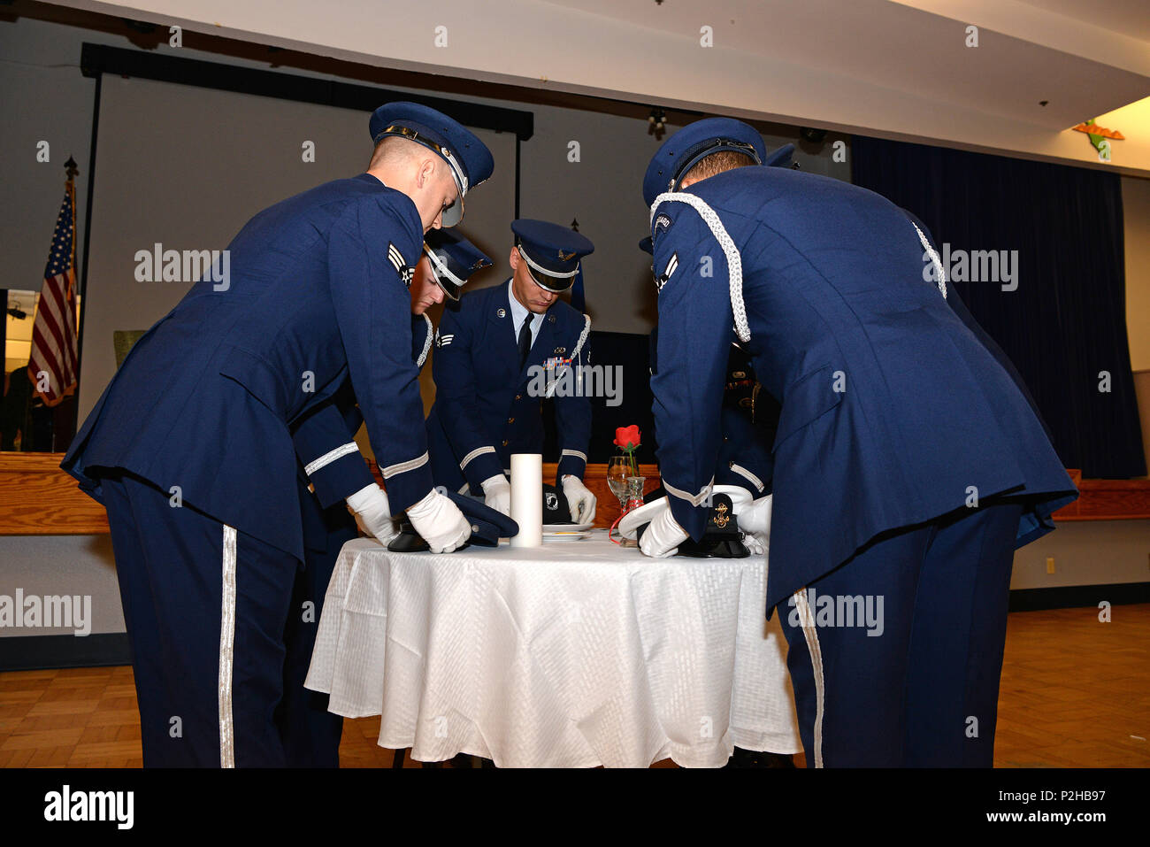 The Beale Air Force Base Honor Guard places the service covers of all ...