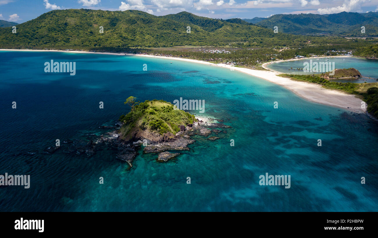 Aerial drone view of beautiful tropical beaches, small islands and surrounding coral reef (Nacpan Beach) Stock Photo