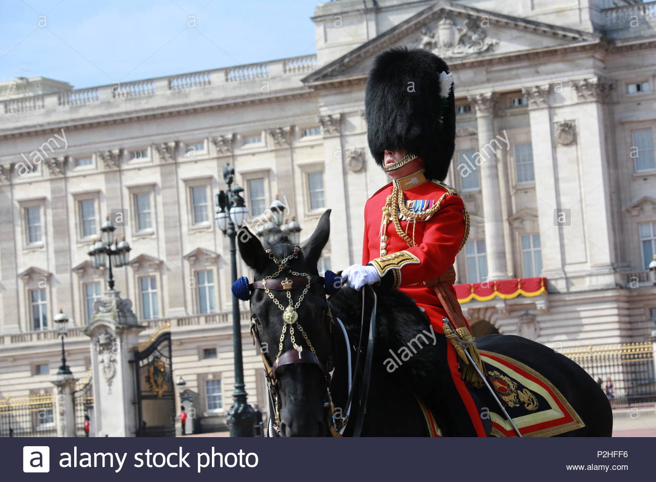 The annual Trooping the Colour has taken place in London in honour of Queen Elizabeth's birthday. Thousands lined the streets to welcome Her Majesty a Stock Photo
