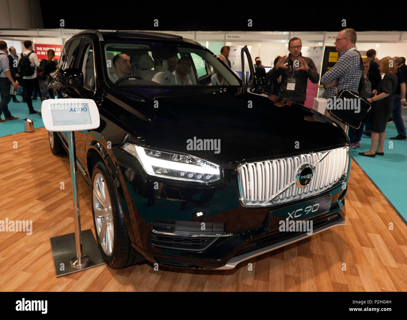 Three-quarter-front view of a  Volvo XC90 at the Volvo Automotive Showcase stand,  part of the AI Summit, ExCel, London Stock Photo
