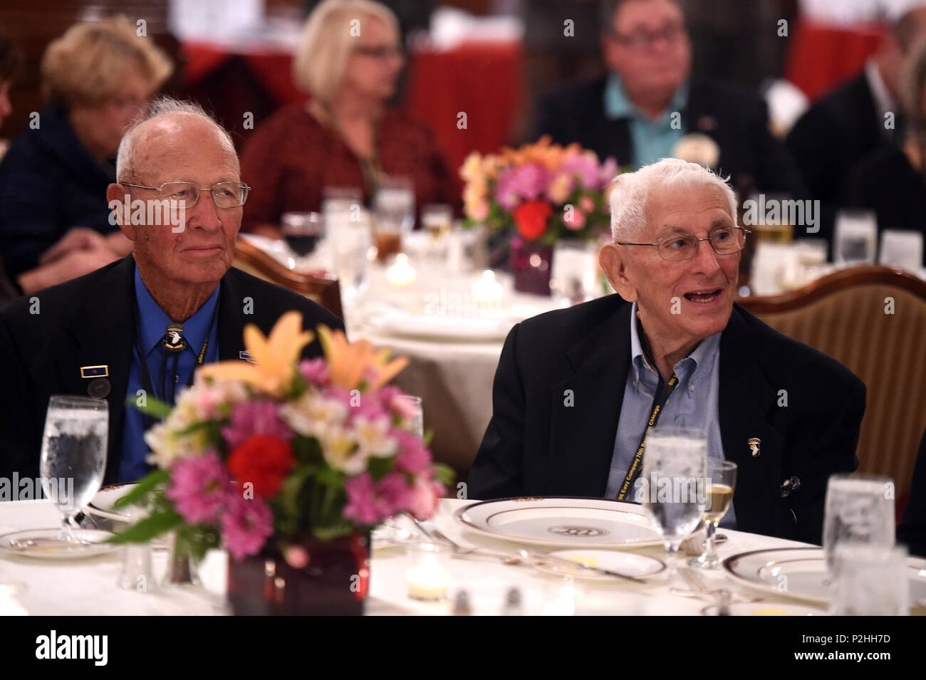 World War II veterans Brad Freeman, sitting left, and Albert Mampre listen to speakers during the 70th anniversary of Easy Company, 2nd Battalion, 506th Parachute Infantry Regiment, 101st Airborne Division reunion in Chicago, September 24, 2016. Both men were members of Easy Company and the only two members at the reunion.  (U.S. Army photo by Sgt. Aaron Berogan/Released) Stock Photo