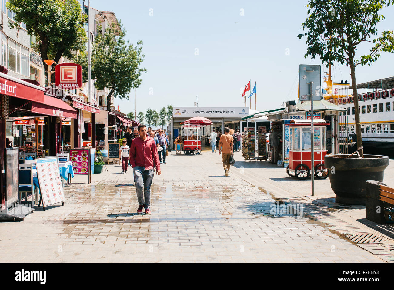 Istanbul, June 17, 2017: Local residents are walking along the street in the Kadikoy district. Ordinary city life or everyday affairs. Stock Photo