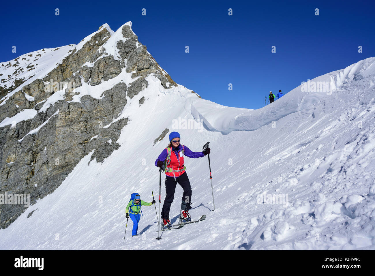 Two persons back-country skiing ascending towards Kleiner Kaserer, Hoellscharte, Kleiner Kaserer, valley of Schmirn, Zillertal A Stock Photo