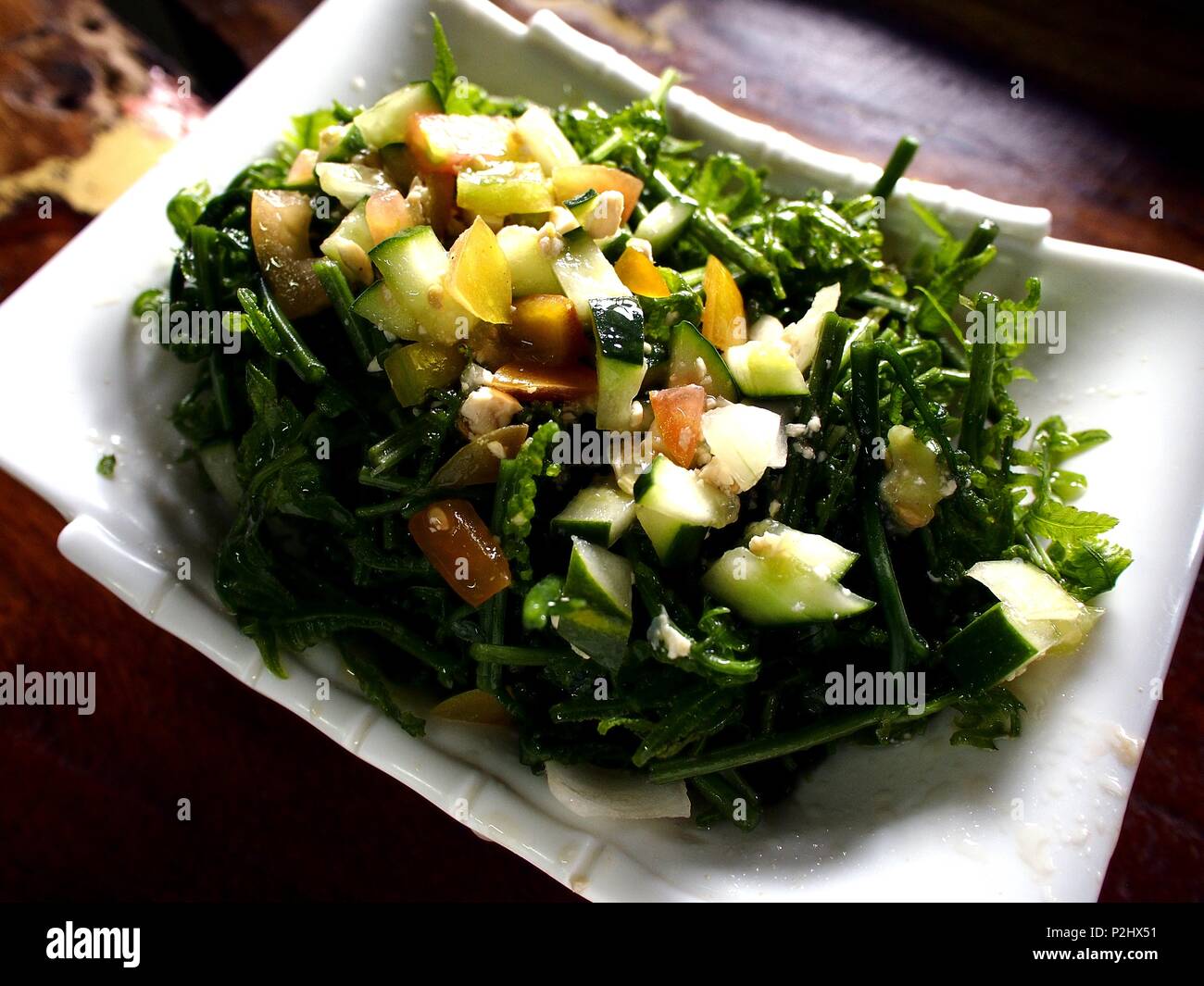 Photo of a plate of Pako Salad or Fiddlehead Fern Salad Stock Photo Alamy