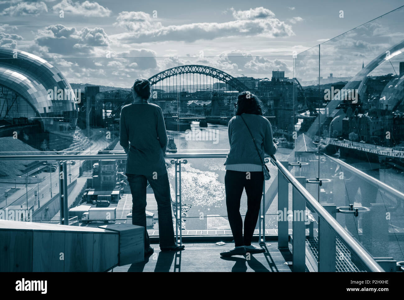 View over the River Tyne towards The Gateshead Sage and Tyne Bridge from viewing platform in BALTIC Centre for Contemporary Art. Gateshead. UK Stock Photo