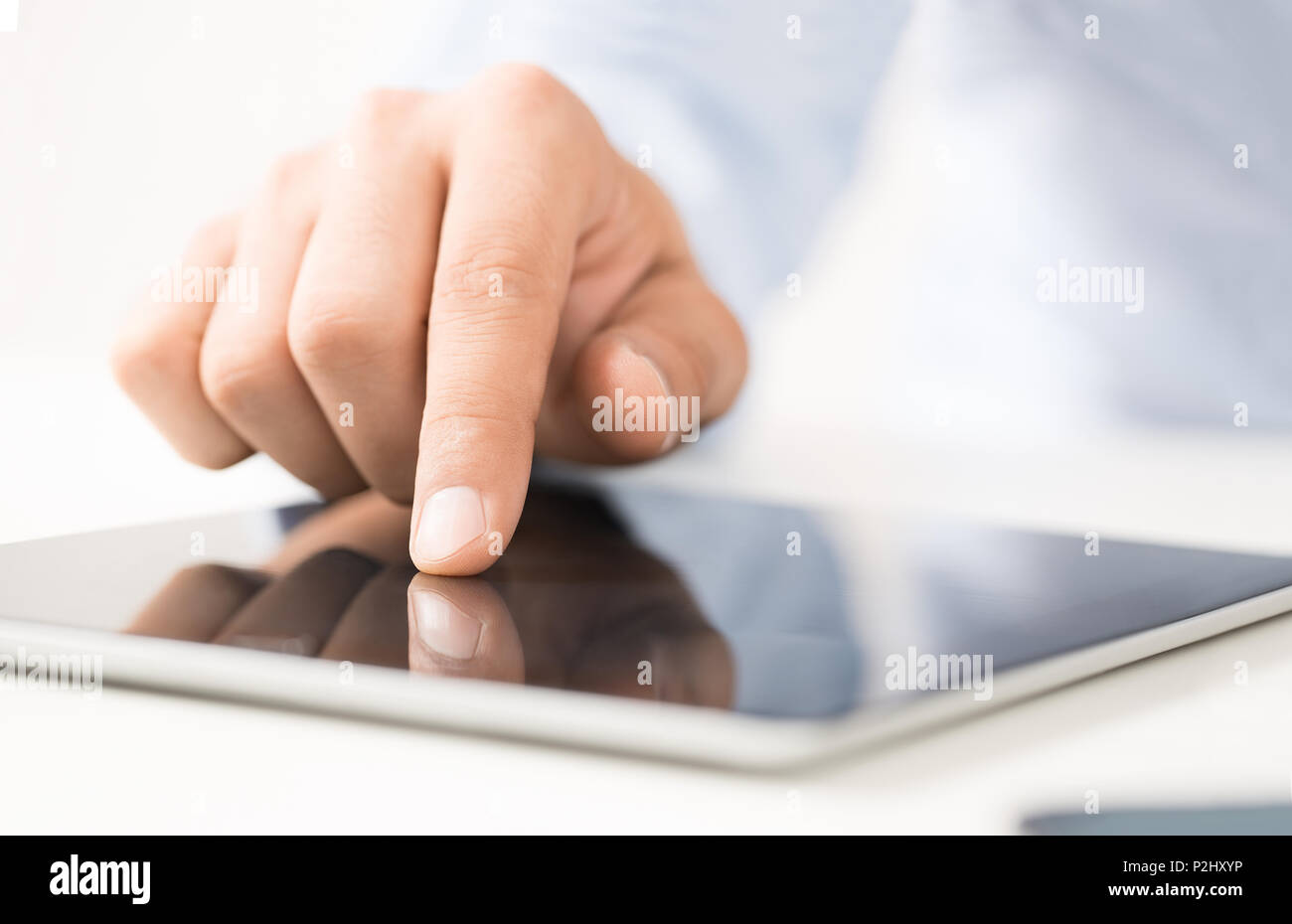 Using digital tablet Stock Photo Alamy