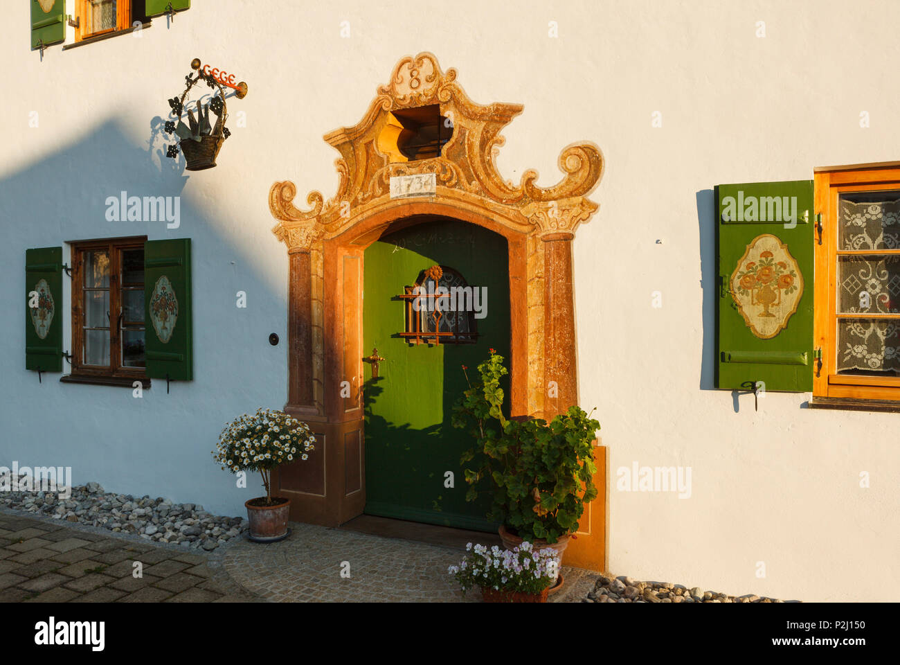 Entrance door to a farmhouse from 1734, Seehausen am Staffelssee, near Murnau, district Garmisch-Partenkirchen, Blue Land, Bavar Stock Photo
