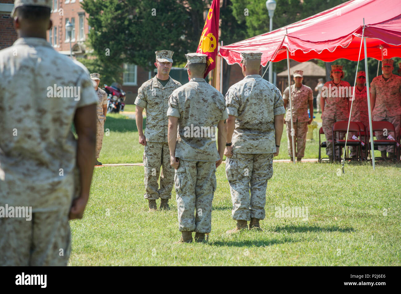 U.S. Marine Corps Robert Gruber stands in front of the formation as the