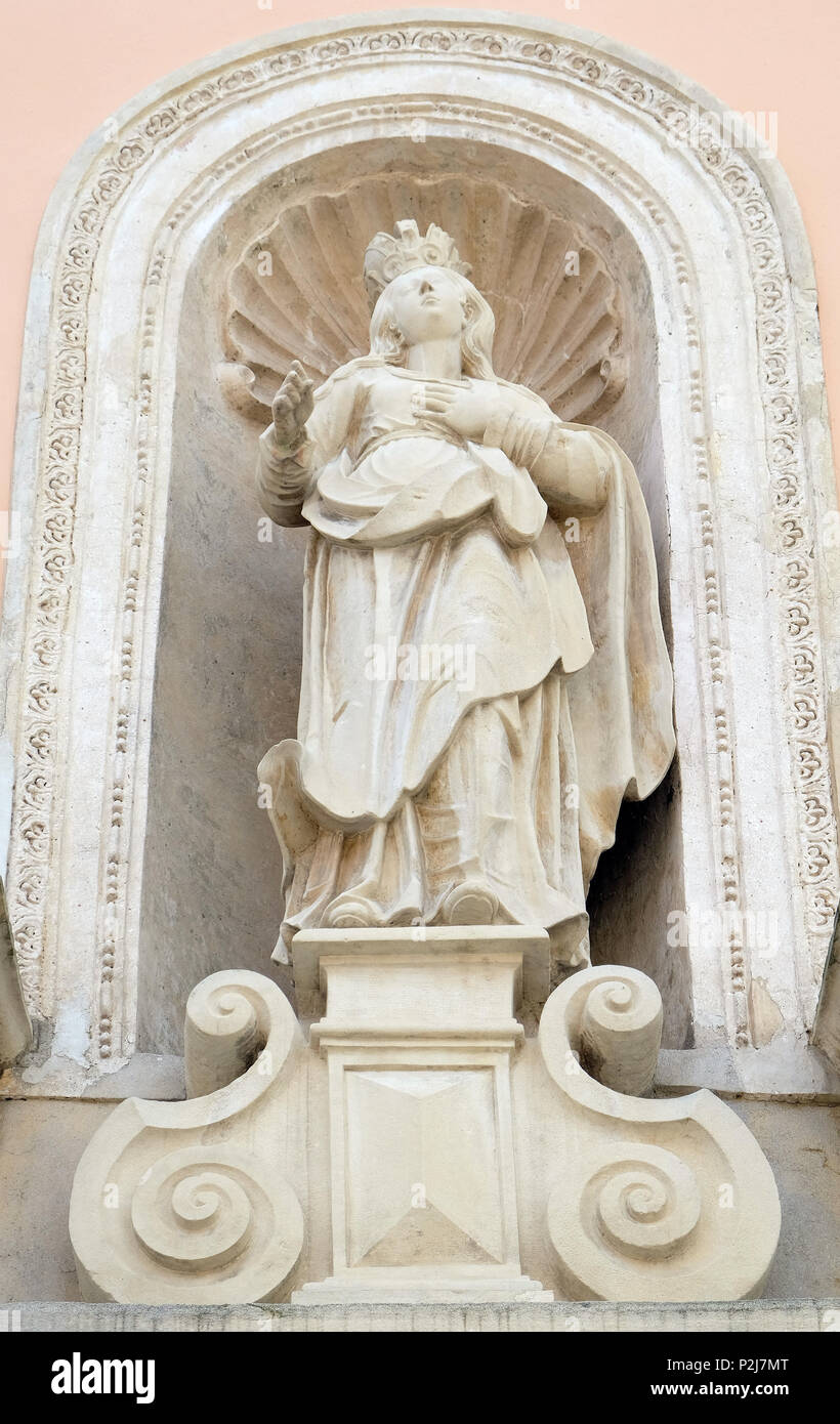Virgin Mary statue on facade of cathedral of Assumption in Varazdin, Croatia Stock Photo