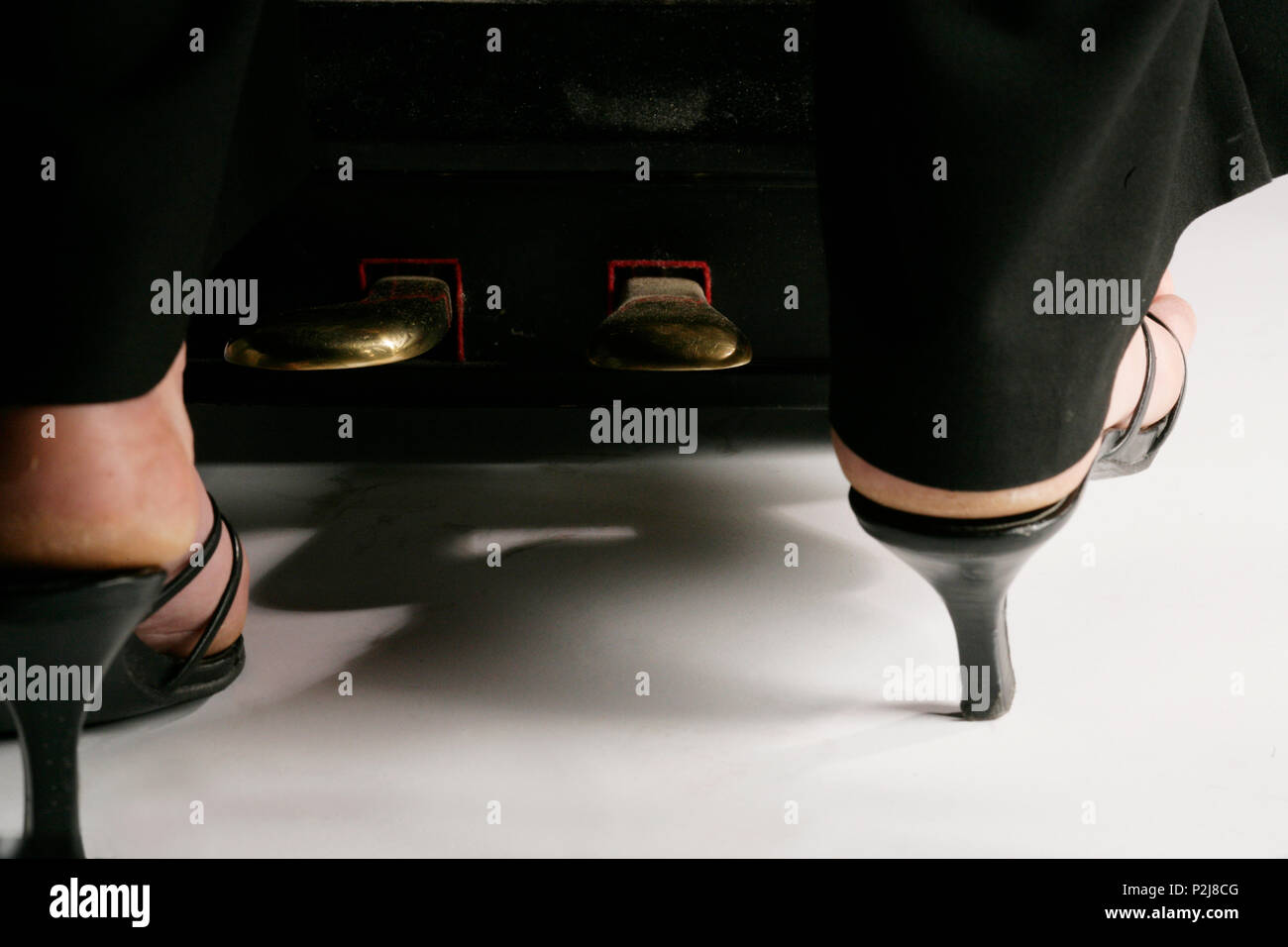 piano pedals and pedalling, close-up Stock Photo