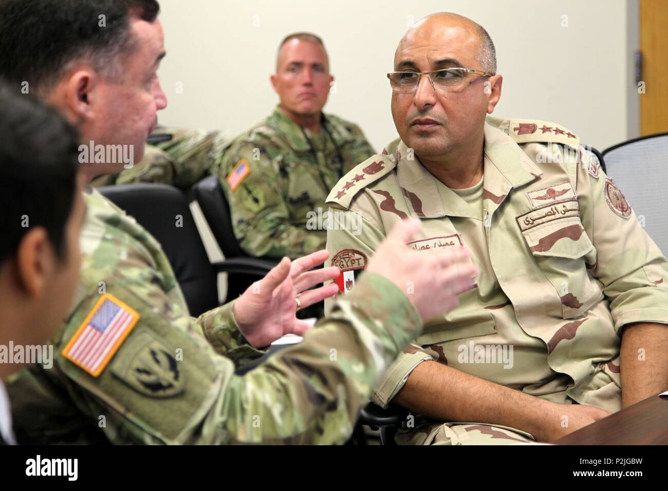 Brig. Gen. Khalil Essam Mohamed Elsayed, commander, Egyptian Human Development and Behavioral Sciences Center, meets with Col. Robert Curris, commander, 4th Military Information Support Group, and other 4th MISG leaders during a visit to Fort Bragg, Sept. 24-28. Elsayed and three other Egyptian army officers traveled here to exchange information in order to coordinate training programs and synchronize efforts with U.S. partners. Stock Photo