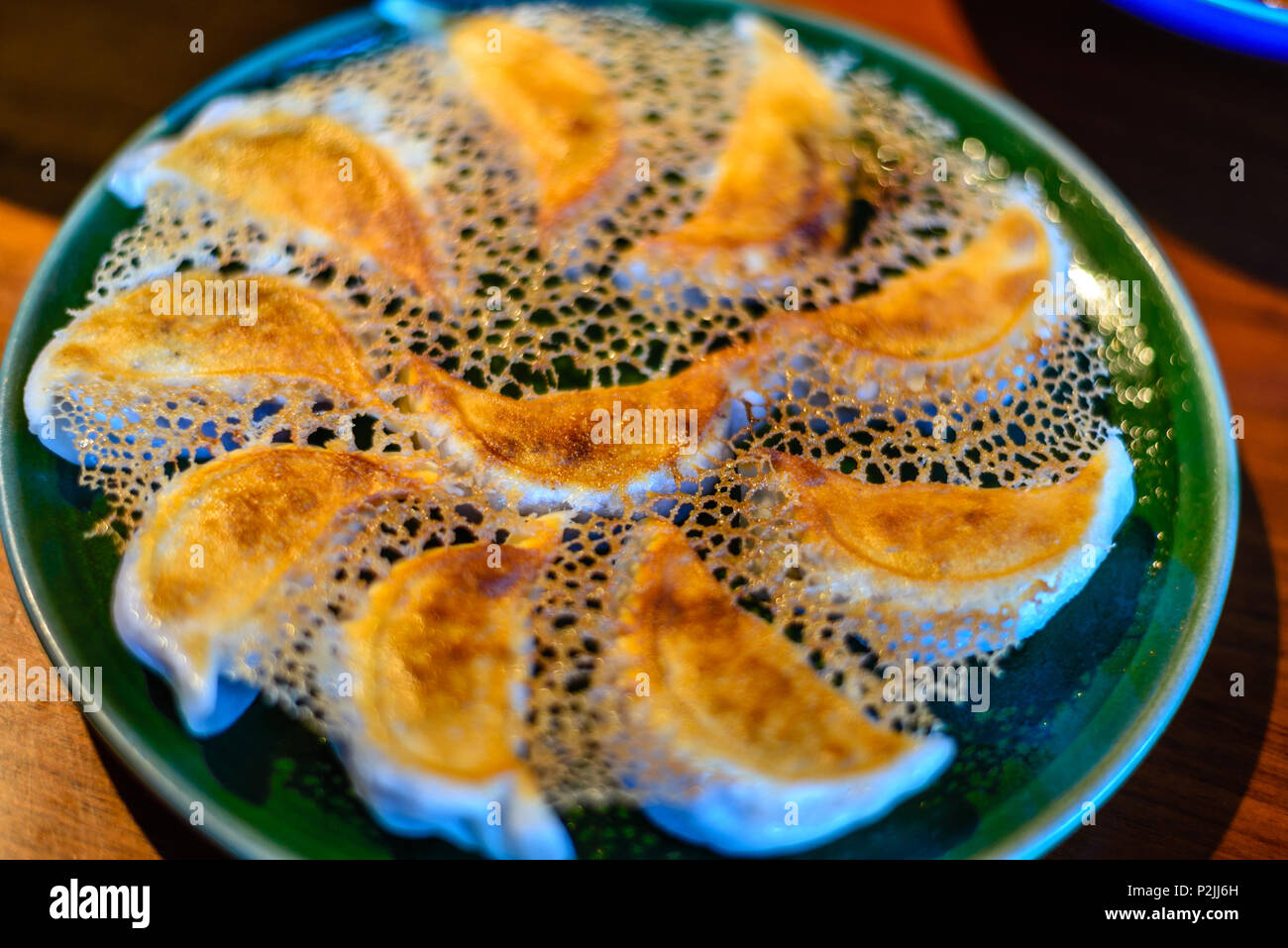 Panfried Minced Pork Dumplings gyoza , Beijing White Cabbage, Yellow