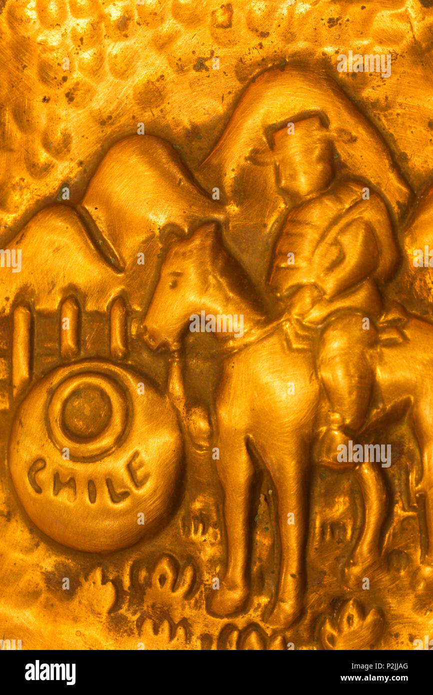 DETAIL OF NINETEEN SIXTIES CHILEAN HAMMERED COPPER TOURIST SOUVENIR BOWL Stock Photo
