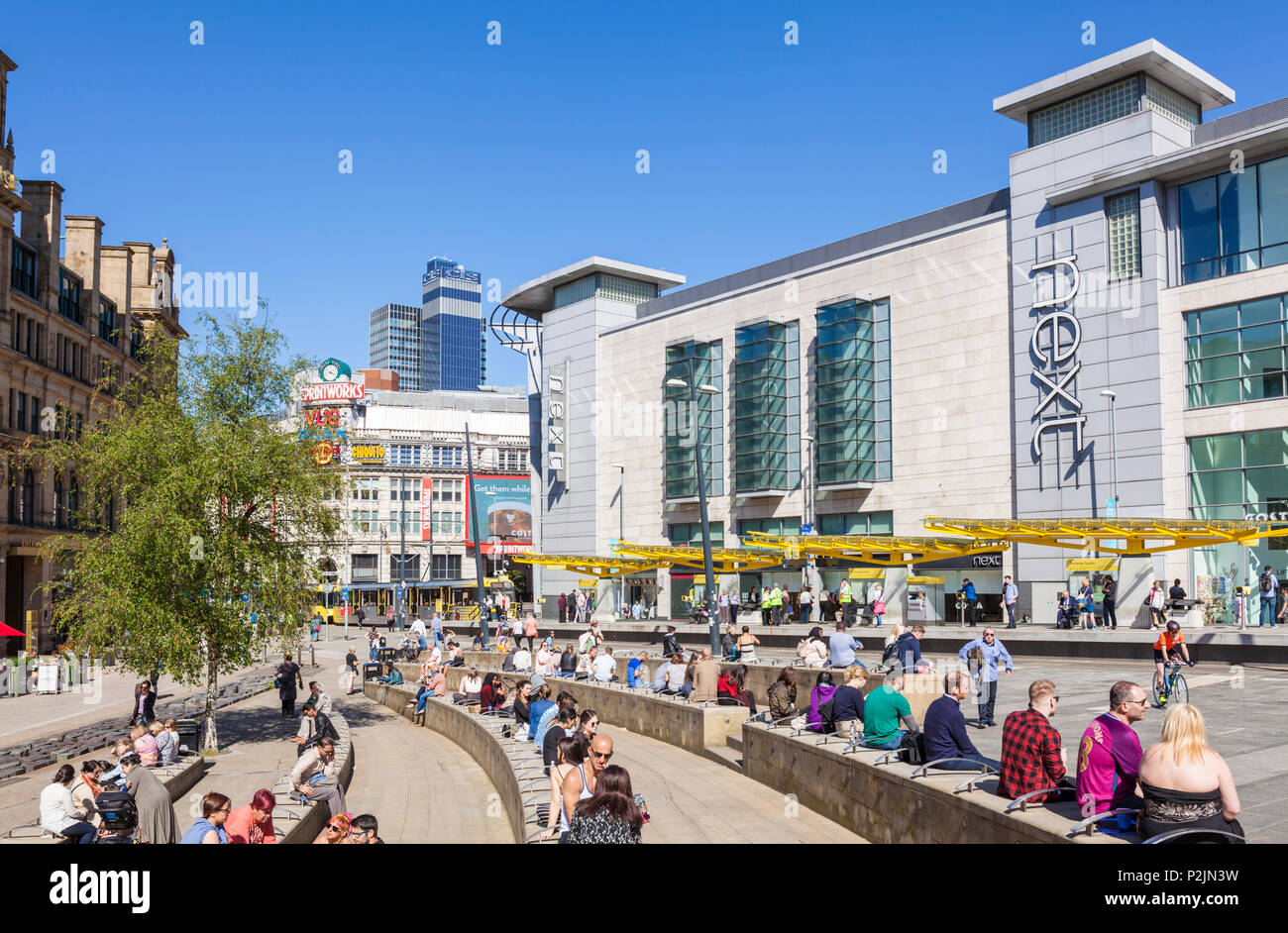 England Manchester England Manchester City centre city center shoppers outside Next store exchange square manchester Arndale centre Manchester uk Stock Photo