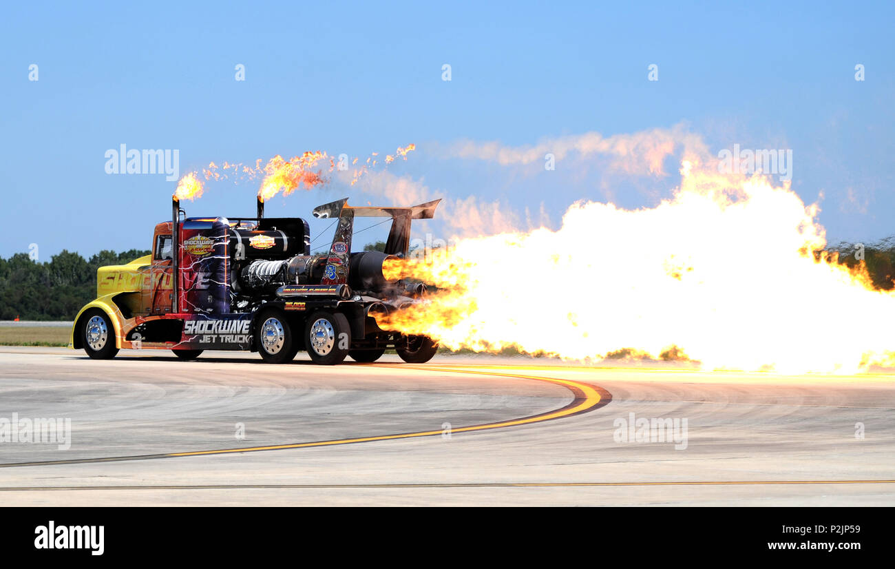The Shockwave Jet Truck, a Peterbuilt semi, extinguishes flames on the flight line during Thunder Over Georgia Air Show on Robins Air Force Base, Ga., Oct. 1, 2016. (U.S. Air Force photo by Tech Sgt. Stephen D. Schester) Stock Photo