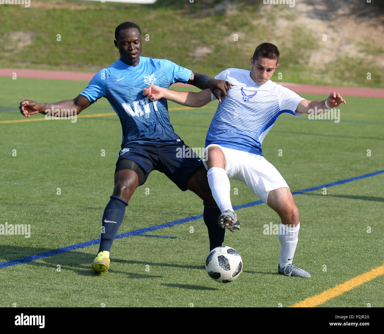 FORT BRAGG, N.C. Navy Petty Officer 1st Class Robinson (left