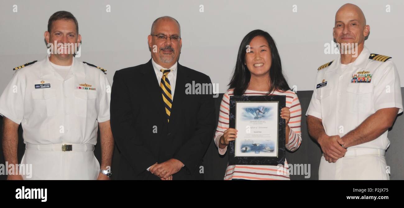 DAHLGREN, Va. Sarah Kim receives her certificate of achievement from