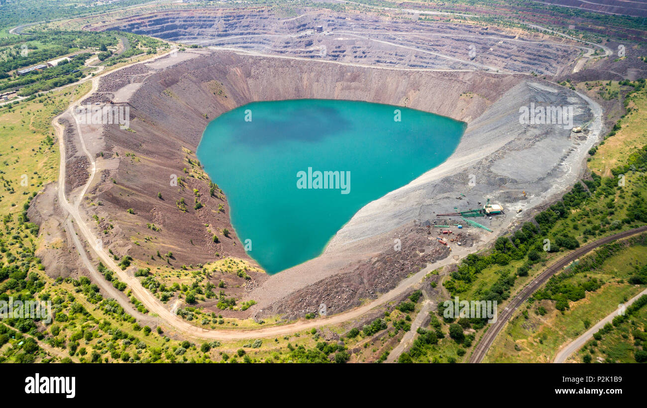 Aerial view of flooded quarry Mining-dressing quarry is flooded Stock Photo  - Alamy
