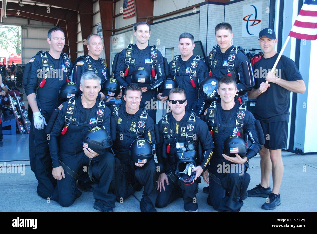 World Champion 8-Way Team   From left to right standing, members of the Golden Knights 8-way Formation Team Sgts. 1st Class Justin Blewitt, Larry Miller, Andrew Starr, Josh Coleman, Sean Sweeney, Ryan Ray, kneeling, Sgts. 1st Class Kurt Isenbarger, Matt Davidson, David Flynn, and Jeshua Stahler, pose for a group photo, Sep. 14, at Ottawa Illinois. Stock Photo