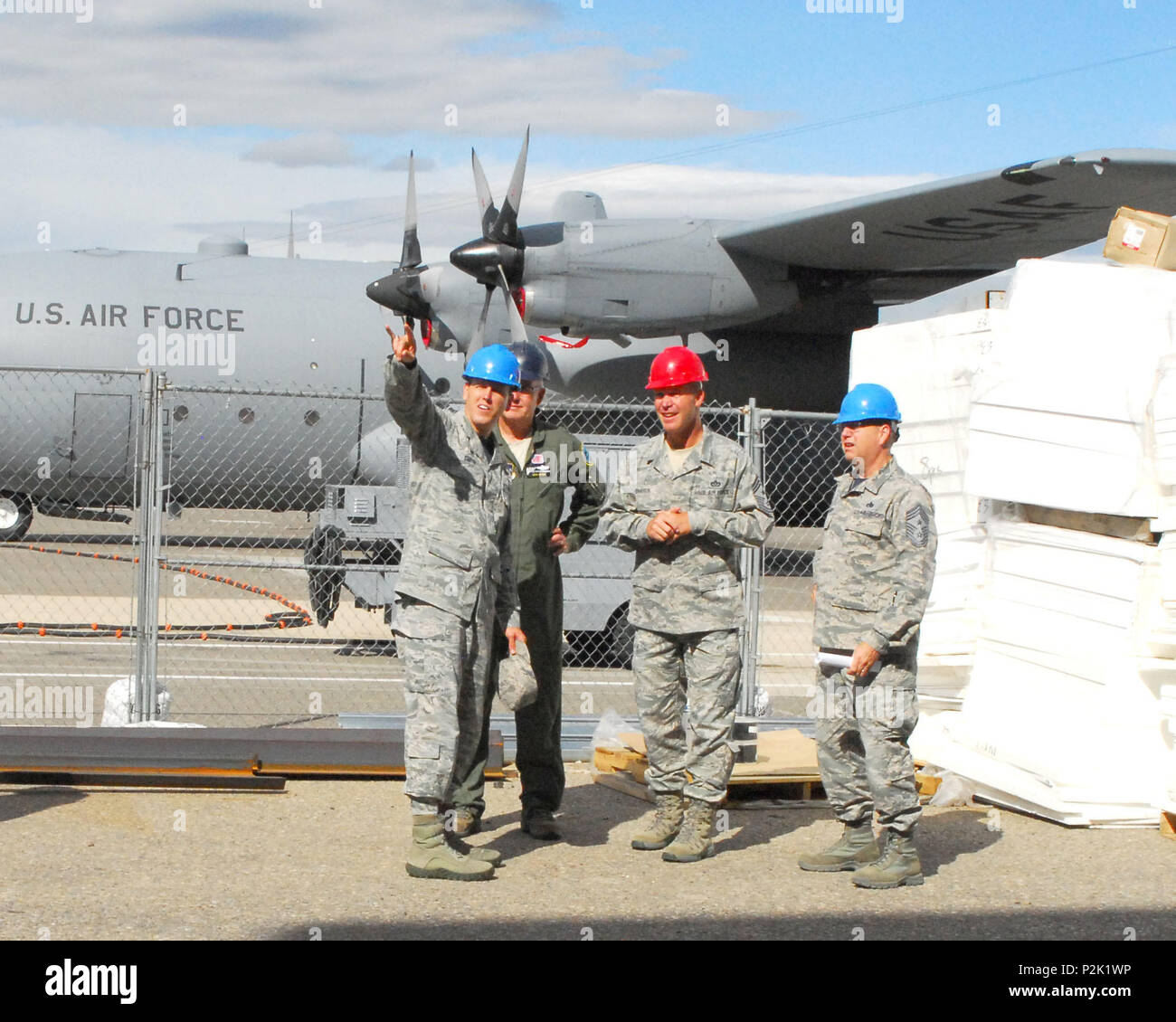 Col. Lee Smith, commander of the 120th Airlift Wing reviews the
