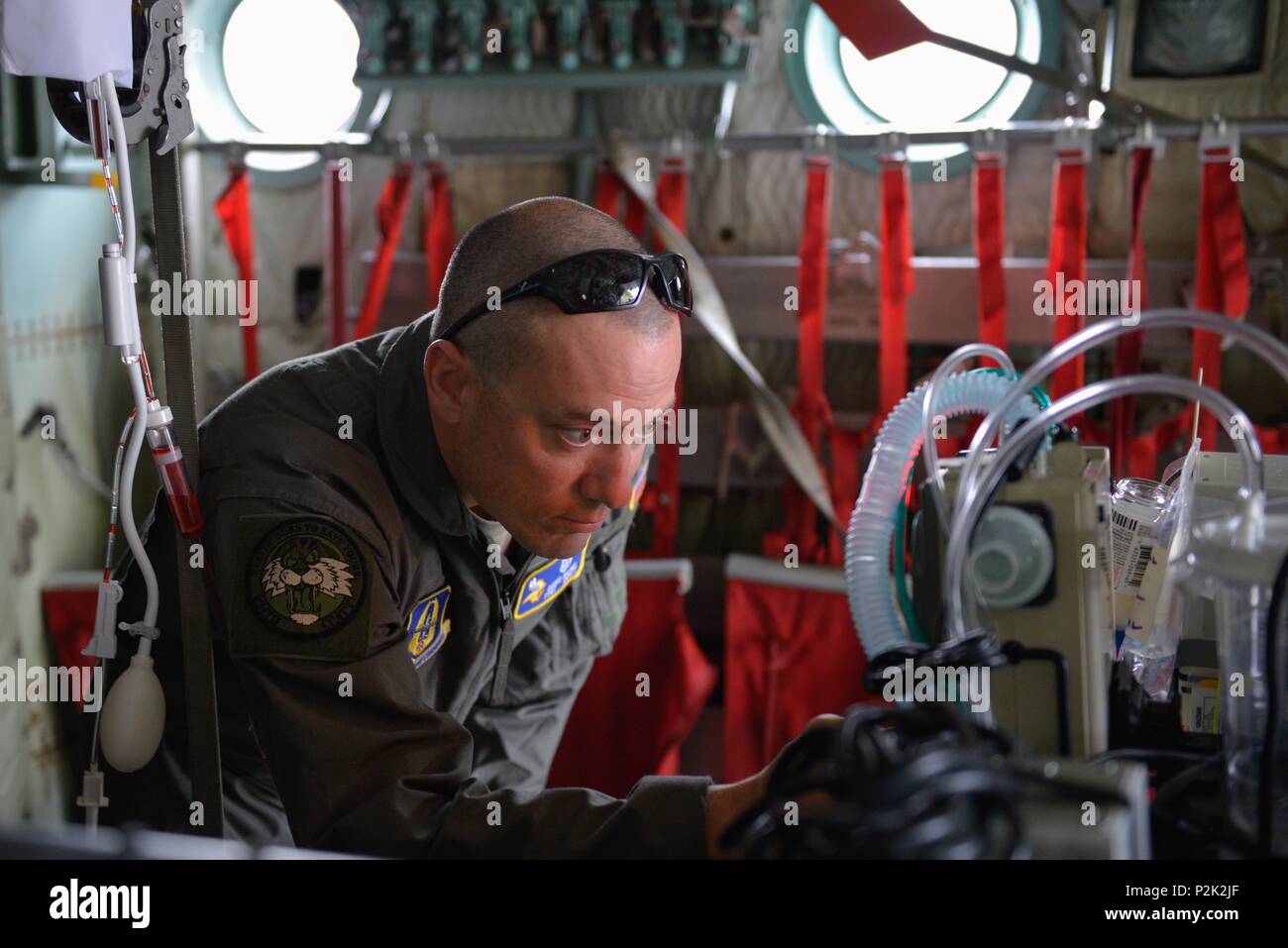 Tech. Sgt. David Pasko, 934th CCATT member, adjusts respiratory control ...