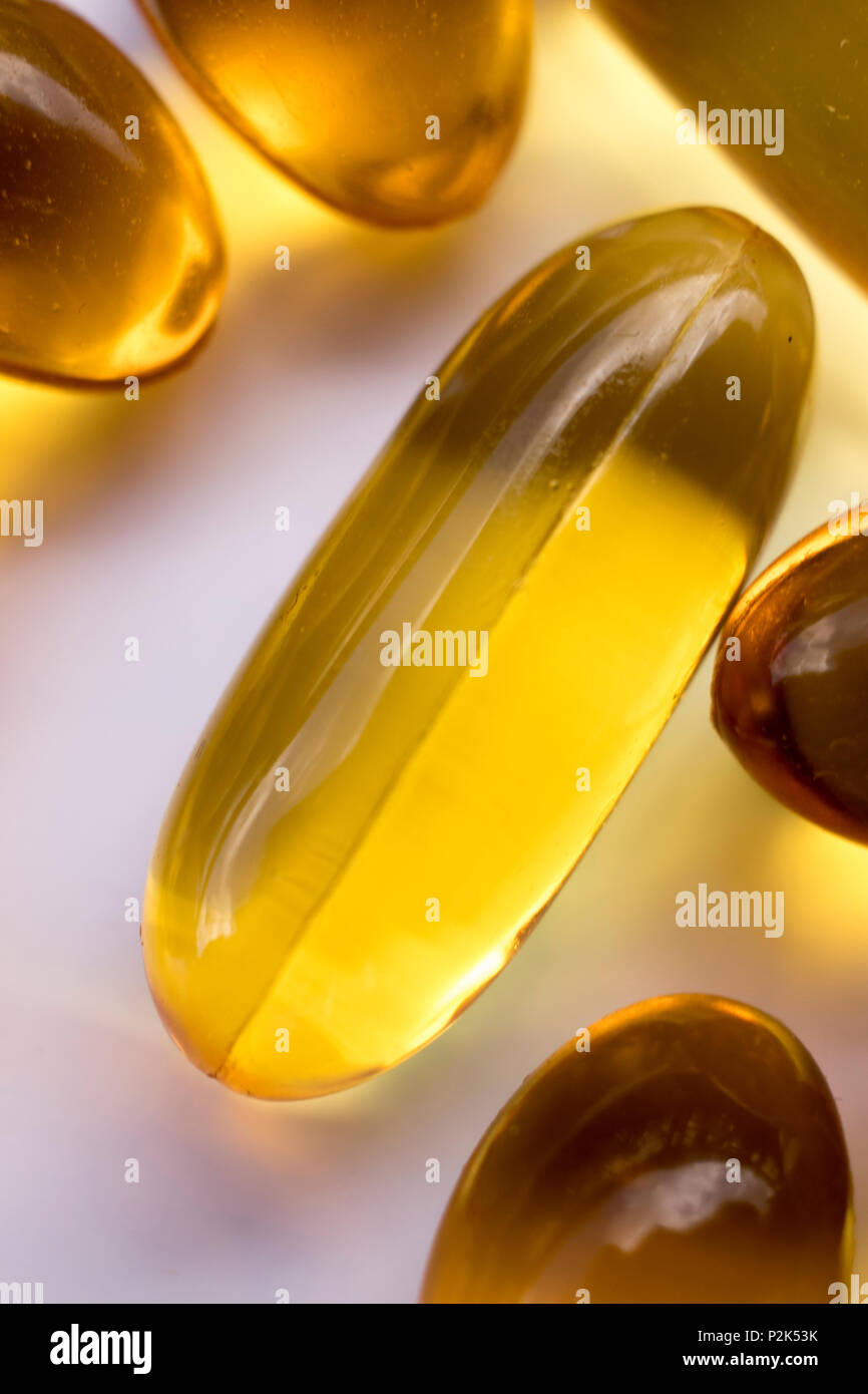 Cod fish liver oil capsules vitamin and mineral health and healthy