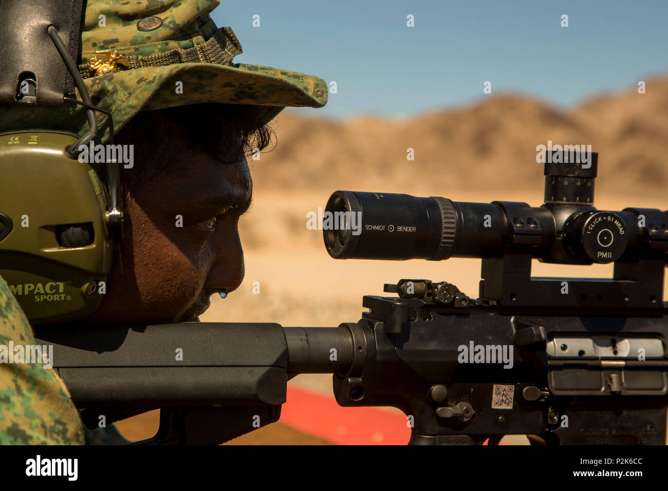 A sniper from the Singapore Armed Forces conducts precision firing at ...