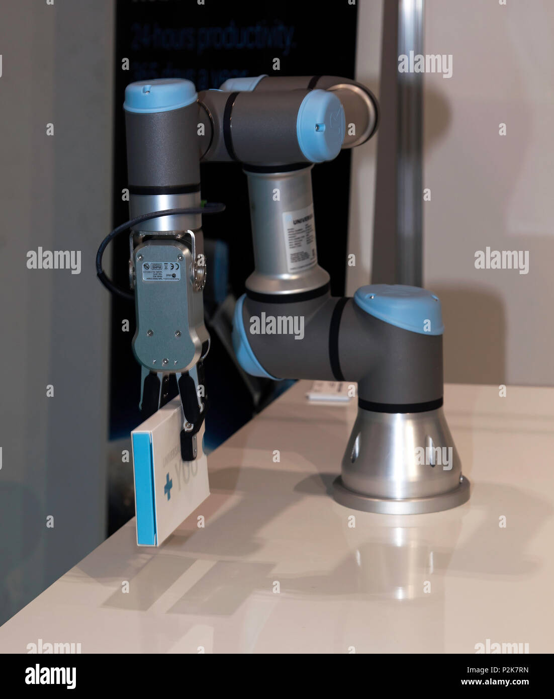 Universal Robots small, UR3, flexible industrial collaborative robot arm,  being demonstrated at the AI Summit, ExCel London Stock Photo - Alamy
