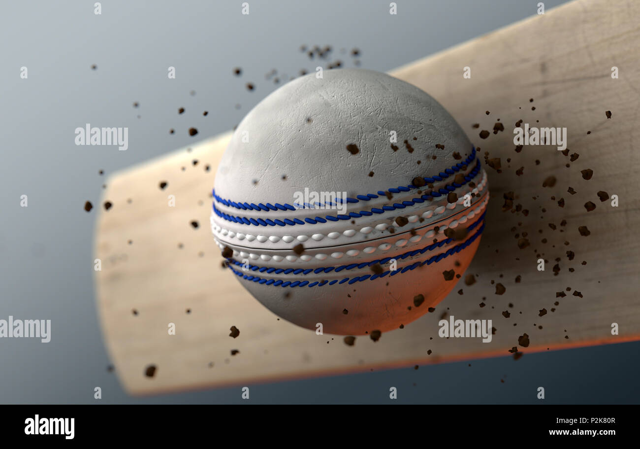 An extreme closeup slow motion action capture of a white cricket ball striking a wooden bat with dirt particles emanating on a dark isolated backgroun Stock Photo