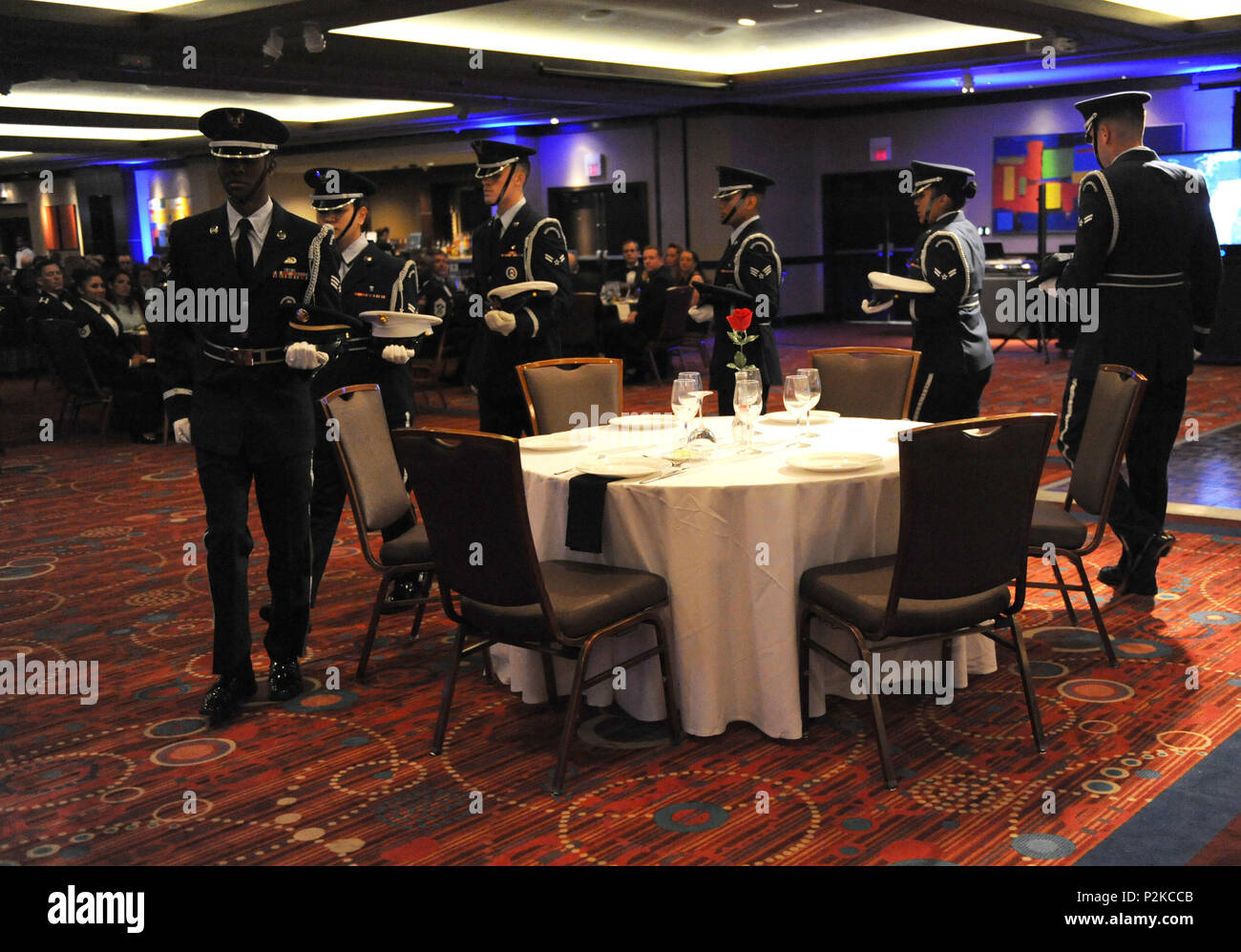 Members of the Keesler Air Force Base Honor Guard perform a POW/MIA table ceremony during the Keesler Air Force Ball at the Imperial Palace Casino Sept. 24, 2016, Biloxi, Miss. The event was sponsored by the Air Force Association John C. Stennis Chapter #332 to celebrate the Air Force’s 69th birthday and the base’s 75th anniversary. (U.S. Air Force photo by Kemberly Groue/Released) Stock Photo