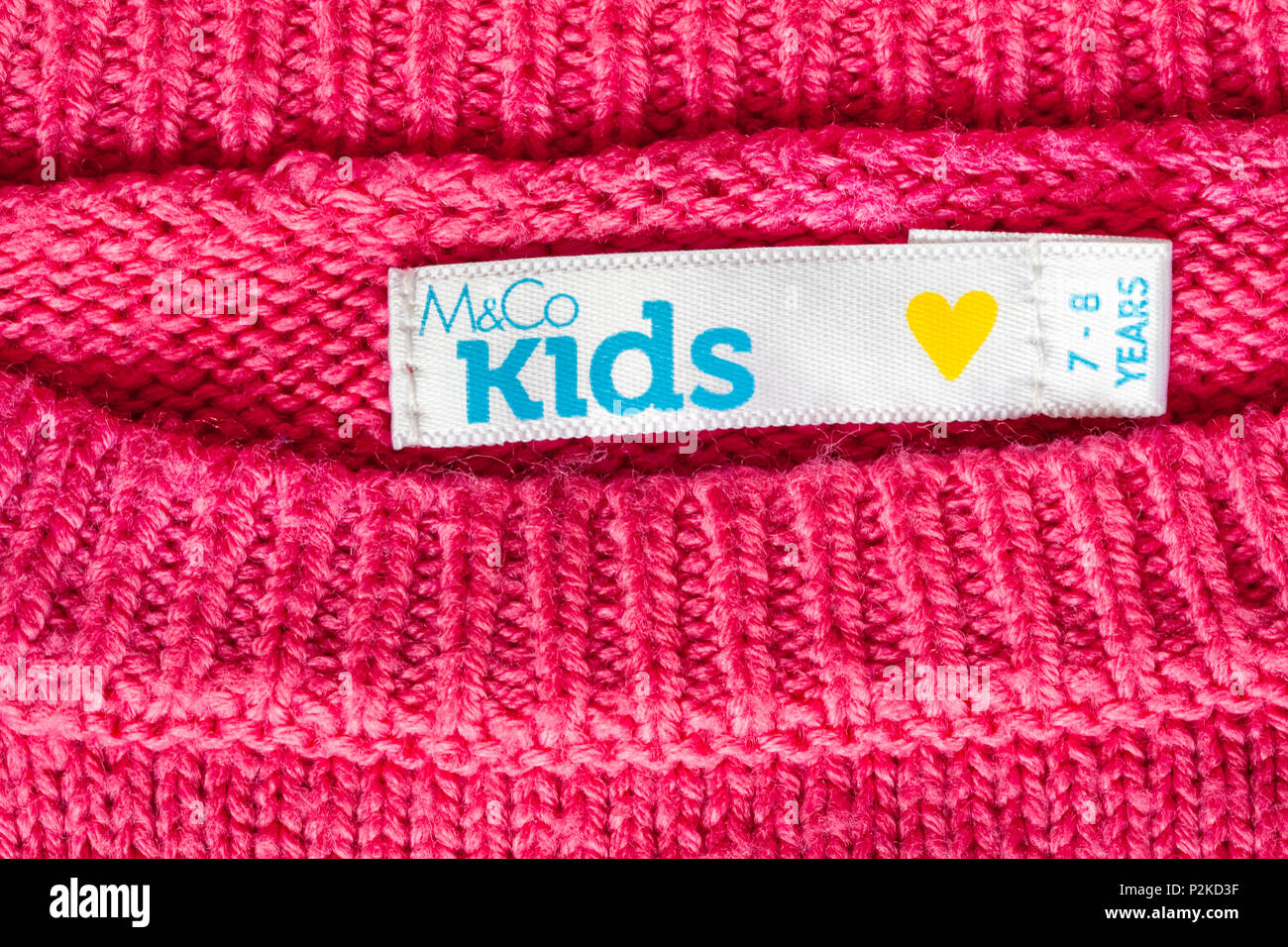 label in M&Co kids girls jumper for 7-8 years Stock Photo