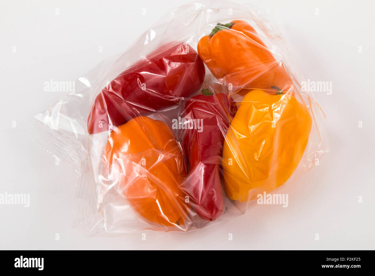 Fresh food, vegetables each individually packaged in plastic wrap, all
