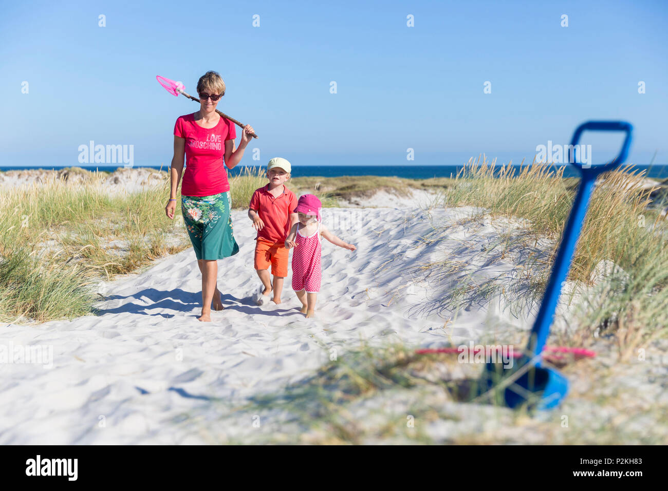 Young family, Mother and children hiking at the dream beach and dunes of Dueodde, sandy beach, Summer, Baltic sea, Bornholm, Due Stock Photo