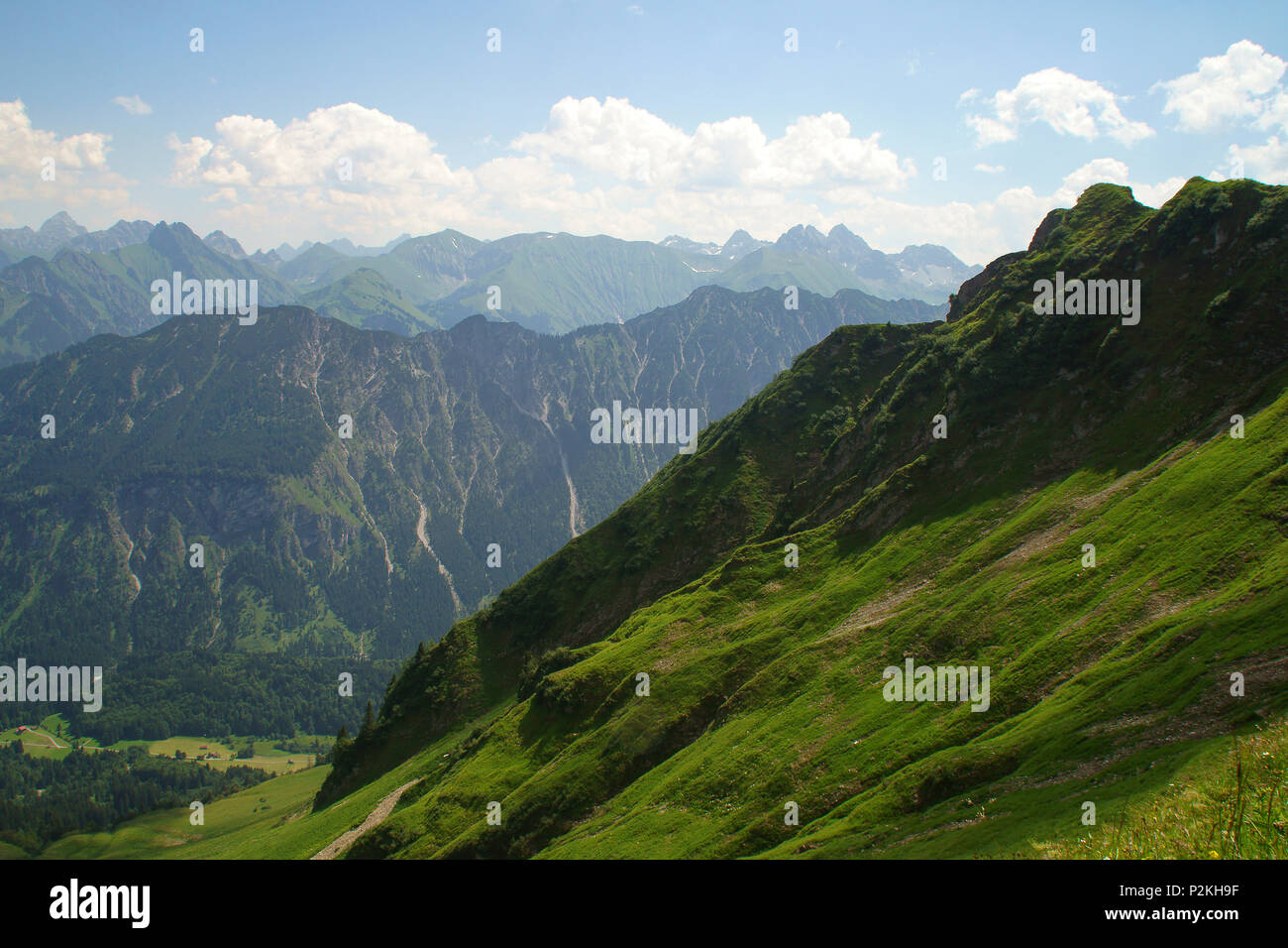 View on the green peaks of the Allgaeu mountains in summer, Oberstdorf, Germany Stock Photo