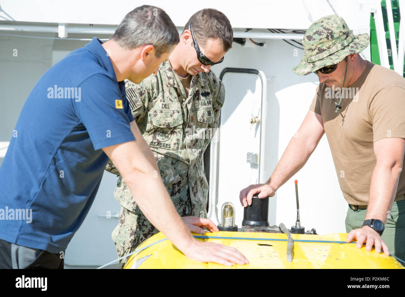 Naval Surface Warfare Center PCD Fleet Liaison Sailors discussed the German Navy’s SeaOtter MK II unmanned underwater vehicle with Atlas Elektronik personnel aboard the Elisabeth Mann Borgese in the Baltic Sea on Sept. 9, 2016. The discussion focused on operational deployment, vehicle capabilities, mine countermeasure operations, UUV control, recovery procedures, and international naval collaboration to enhance interoperability and maritime security. Stock Photo