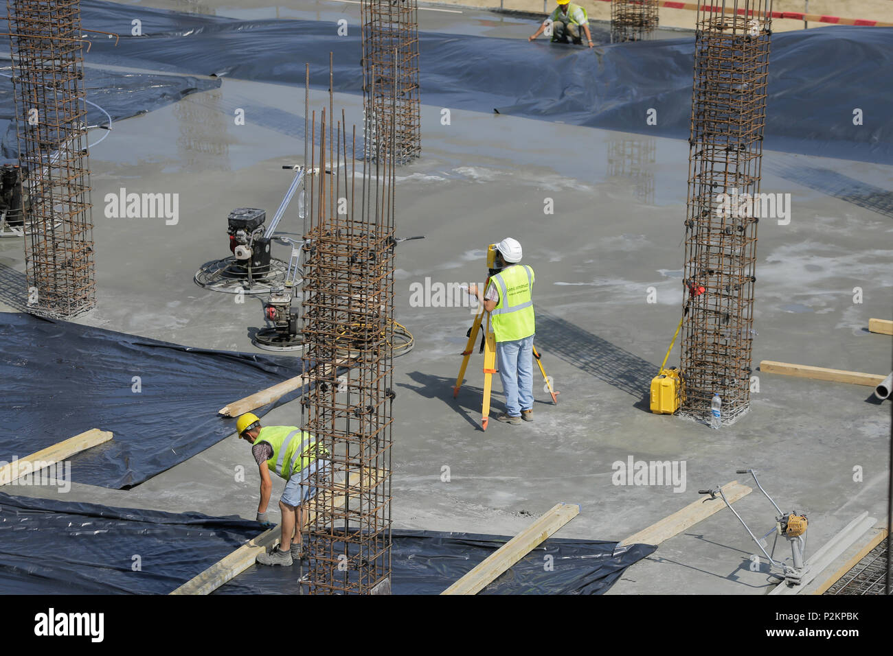 BUCHAREST, ROMANIA - JUNE 14, 2018: Cadastral engineer conducting land management expertise on a construction site Stock Photo