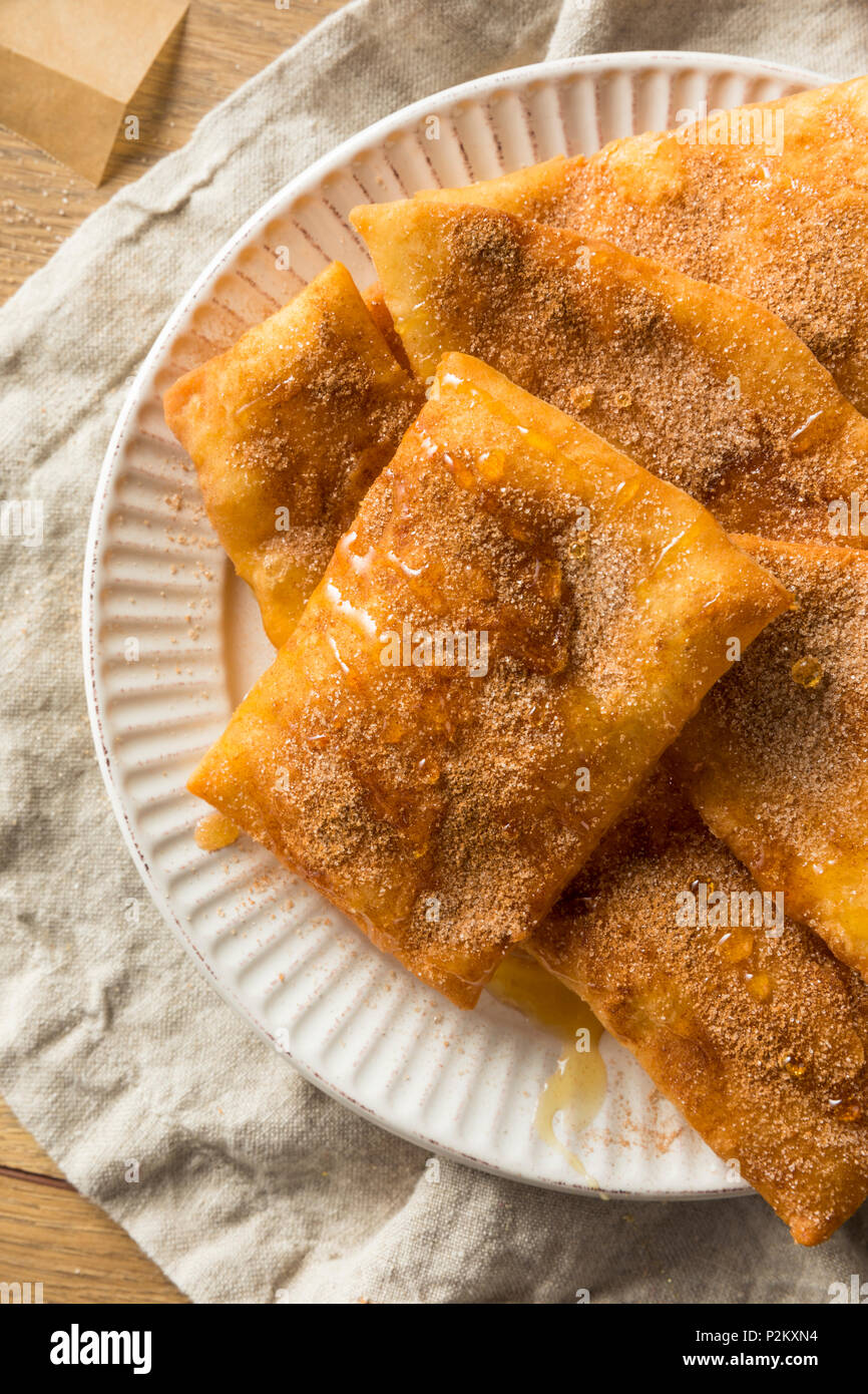 Homemade Deep Fried Mexican Sopapillas with Cinnamon Sugar Stock Photo