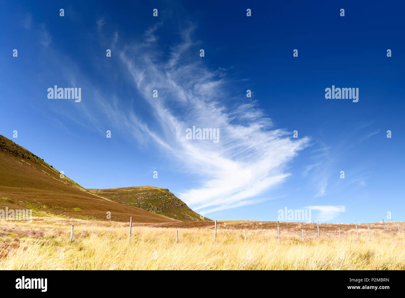 Cloud appearing to come from the hillside like a breath of cold air. Scotland. 27 May 2018 Stock Photo