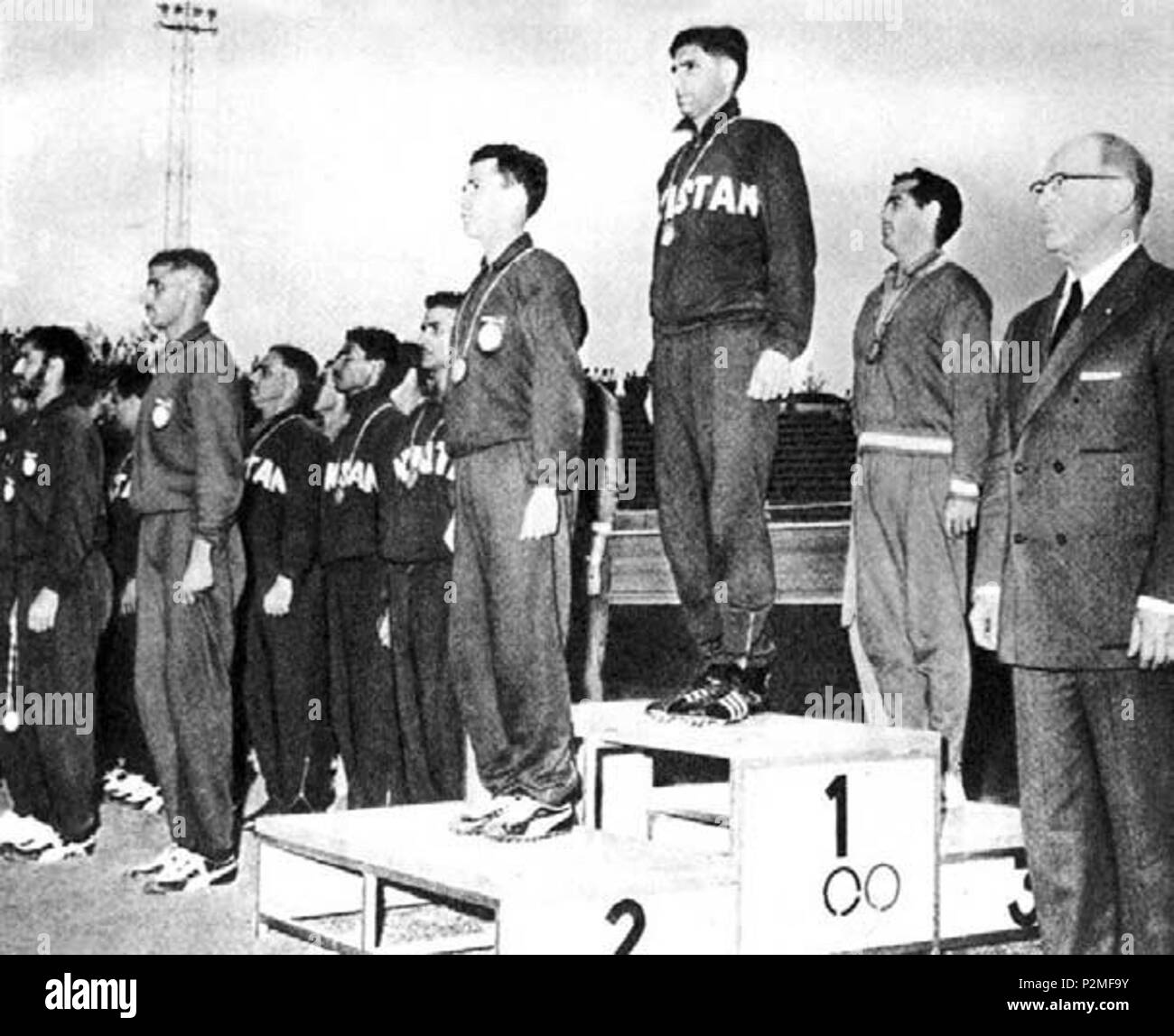 . Rome, Olympic Velodrome. The medal ceremony for the men's field hockey tournament at the 17th Olympic games in Rome; gold medalist were Pakistan national team; silver medalist India and bronze medalist were Spain. 9 September 1960. © Rome 1960 by the Organizing Committee of the Games of the XVII Olympiad 39 Hockey su prato Olimpiadi 1960 premiazione Stock Photo
