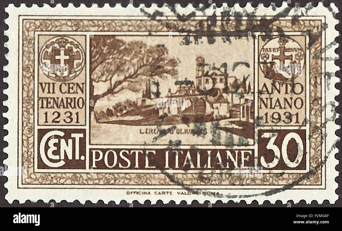 . Stamp of the Kingdom of Italy; 1931; commemorative stamp of the issue '700th anniversary of the death of Saint Anthony': stamp drawing with an view to the entrance to the 'Hermitage of Olivares' (Italian inscription: 'L'Eremo d'Olivares') = the church 'Igreja de Santo António dos Olivais' in/at Coimbra (Portugal); postmarked in 1931 Stamp: Michel: No. 364; Yvert & Tellier: No. 275; Scott: No. 260 Color: brown Watermark: Italy No. 1 (crown) Nominal value: 30 Cent. (Centesimi) Postage validity: from 9 March 1931 until 31 July 1932 Stamp picture size (printed area, without below names line): 37 Stock Photo