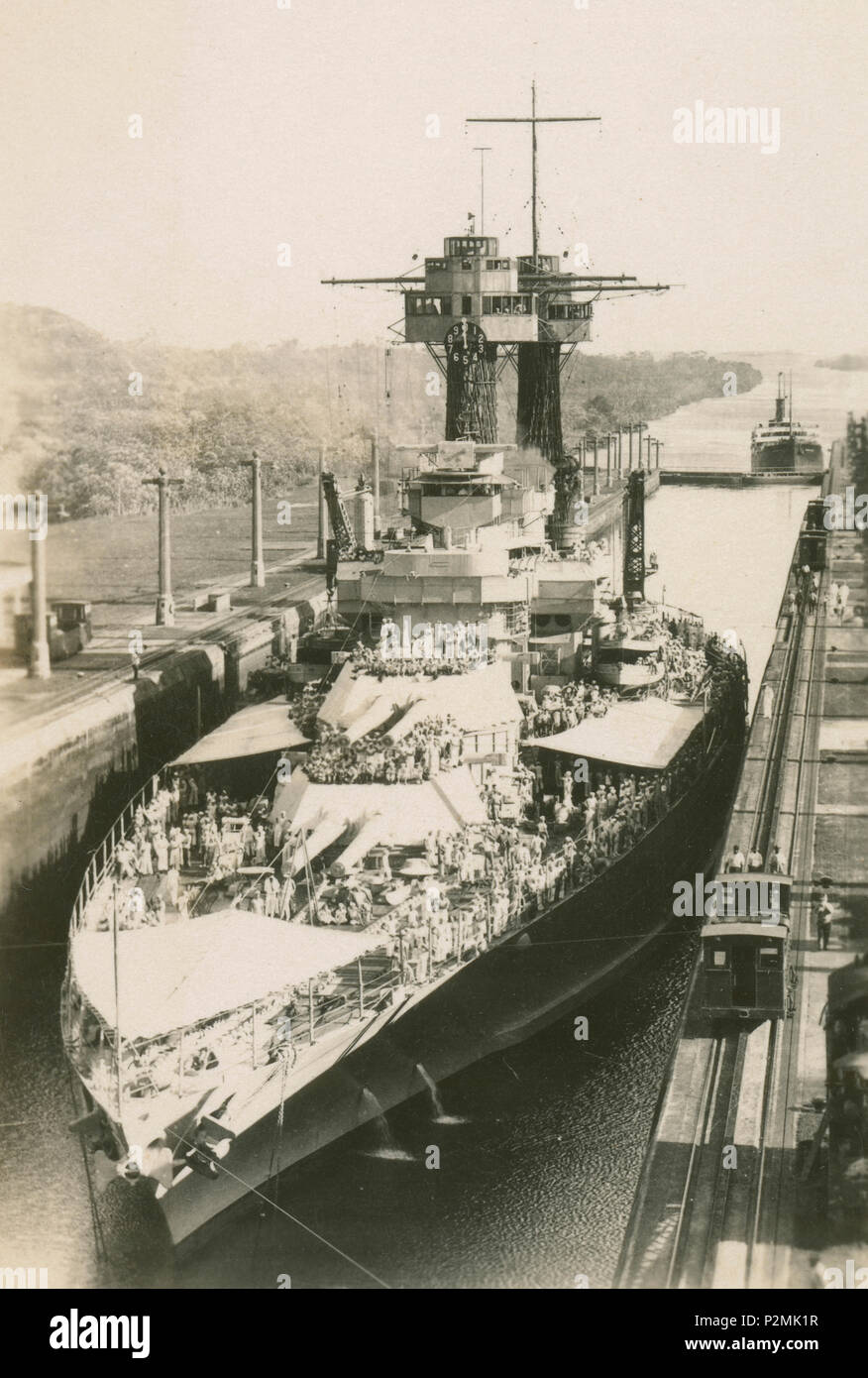 Antique February 13, 1923 photograph, USS Maryland (BB-46) in the Gatun Locks of the Panama Canal. USS Maryland (BB-46), also known as 'Old Mary' or 'Fighting Mary' to her crewmates, was a Colorado-class battleship. SOURCE: ORIGINAL PHOTOGRAPH Stock Photo