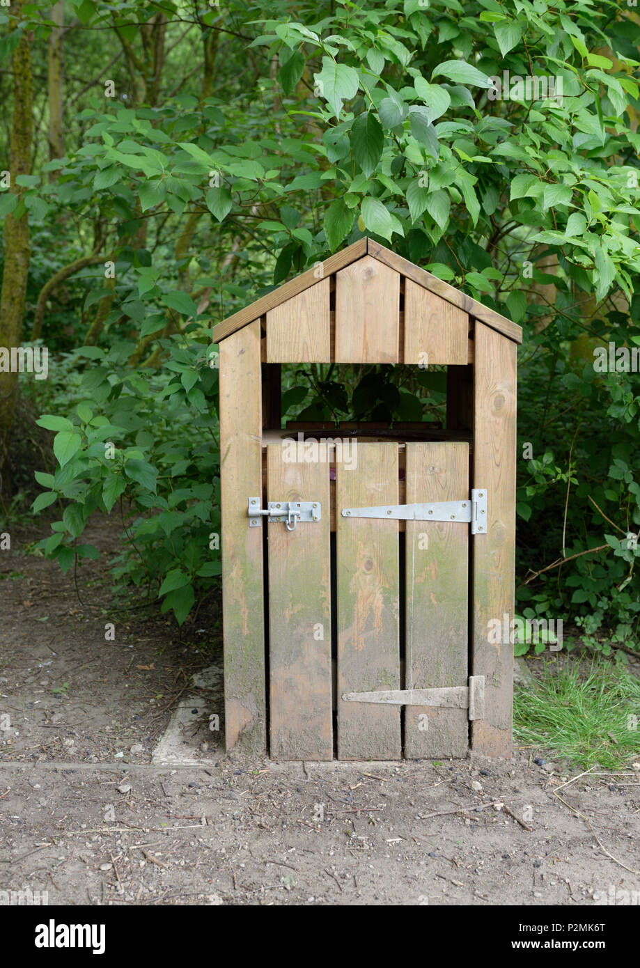 Wooden dustbin store in burrs country park bury lancashire uk Stock Photo