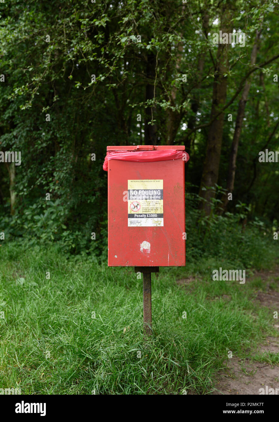 Red dog waste bin burrs country park bury lancashire uk Stock Photo Alamy