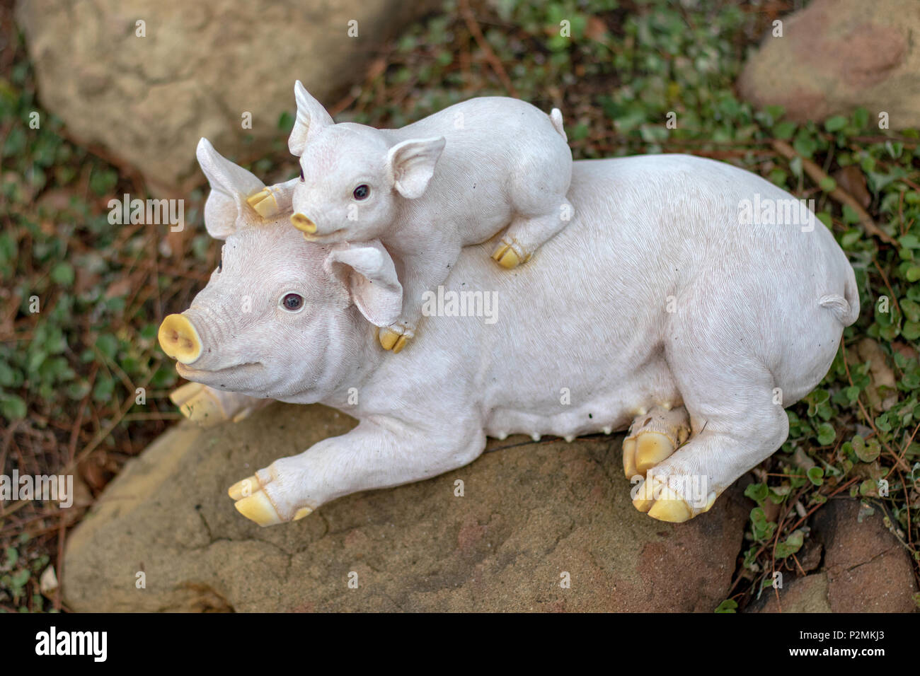 Whimsical Garden Art Decoration - Mother Pig with Baby Stock Photo