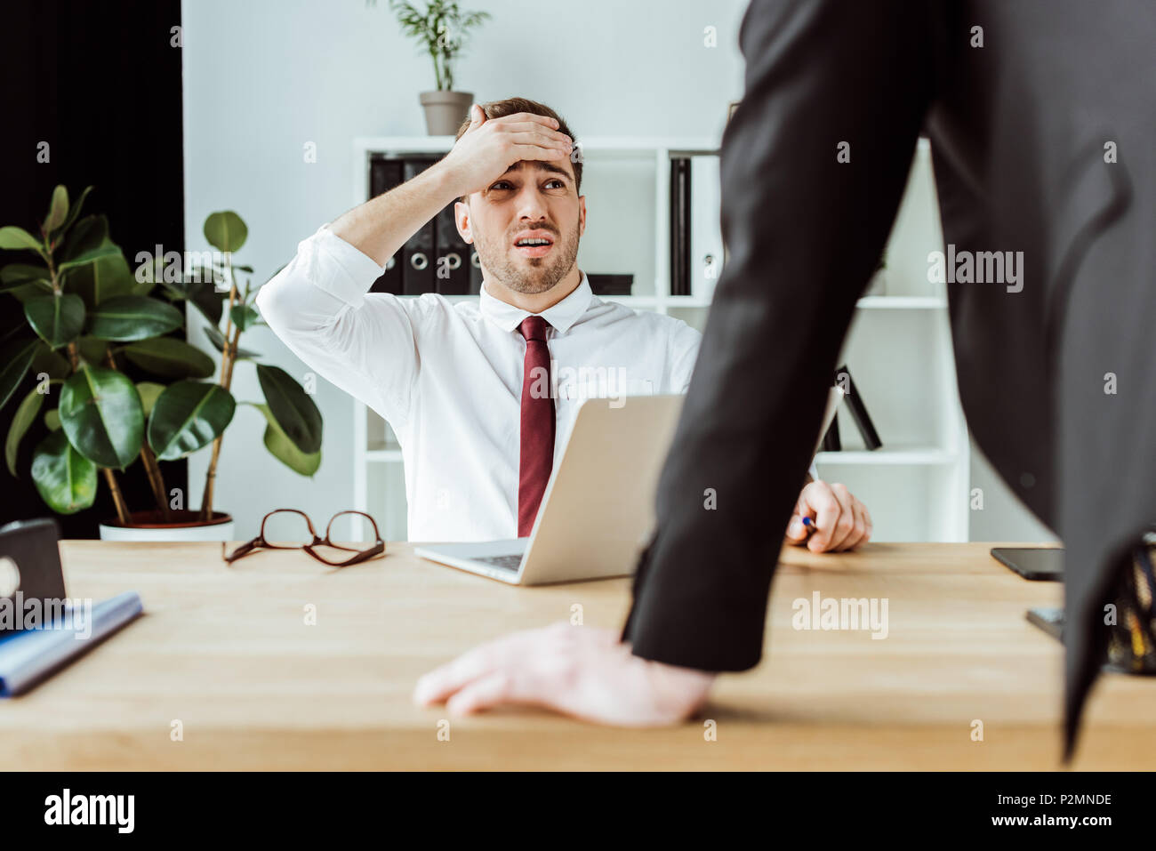 Young man scared looking computer hi-res stock photography and images - Alamy
